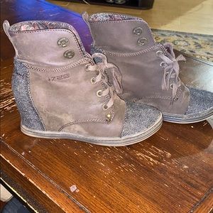 Distressed wedge boots